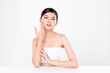 © kitthanes  - Beautiful young asian woman with clean fresh skin on white background, Face care, Facial treatment, Cosmetology, beauty and spa, Asian women portrait.