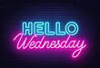 Hello Wednesday sign on brick wall background.