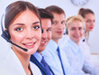 © lenets_tan - Attractive Smiling positive young businesspeople and colleagues in a call center office