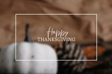 Wall Mural - Happy Thanksgiving text with frame on earthy rustic background for fall season holiday celebration.