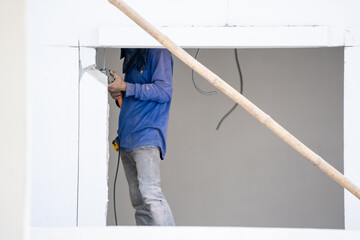 Poster - Construction worker are working at construction of housing estates.