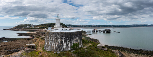 Poster - view of the Mumbles headland with the historic lighthouse and piers in Swansea Bay