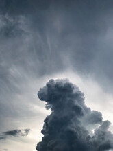 An Upward View Of A Towering Thunderstorm