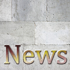 Fototapete - News carved on white stone wall