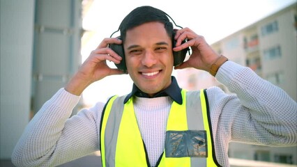 Poster - Building construction, man and safety ear headphones for happy, smile and motivation worker or engineering employee. Portrait of industrial architect with property vision for real estate architecture