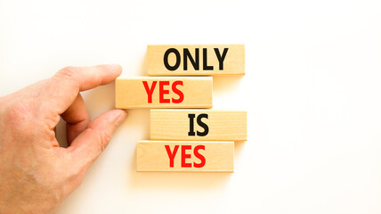 Wall Mural - Only yes is yes symbol. Concept words Only yes is yes on wooden blocks on a beautiful white table white background. Businessman hand. Business, psychological only yes is yes concept.