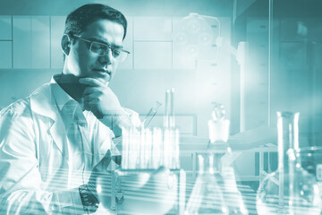 Poster - doctor in laboratory. guy with medical flasks. therapist holds test tube with tests. doctor consider