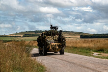 British Army Supacat Jackal 4x4 Rapid Assault, Fire Support And Reconnaissance Vehicle In Action On A Military Exercise