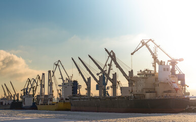  Cargo Docks in St. Petersburg. Unloading cargo containers on a frozen river.