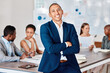 © M Einero/peopleimages.com - Leadership, success and teamwork, a businessman in a meeting in an office boardroom, with a smile. Diversity, collaboration and working together, proud team leader with support for staff and partners