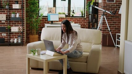 Poster - Hurried asian woman working remotely on startup project because of early deadline. Beautiful freelancer doing remote work on modern laptop while developing business ideas at home.