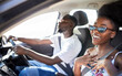 African couple driving in car on holiday, smile for travel on vacation in summer and conversation on road trip journey together. Happy man and woman with transport on date, talking and being funny