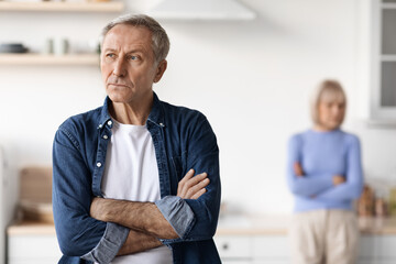 Wall Mural - Portrait of upset mature man, having quarrel with his wife