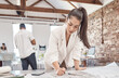 © C Haas/peopleimages.com - Architecture, young woman and designer planning building blueprint, construction project and property development in startup agency. Engineering work, industrial creative and focus floor plan expert