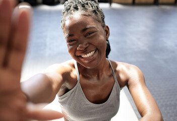 Wall Mural - Fitness, happy and black woman taking a selfie in the gym after training, exercise and workout alone. Smile, healthy and young African woman influencer, wellness and active lifestyle on social media