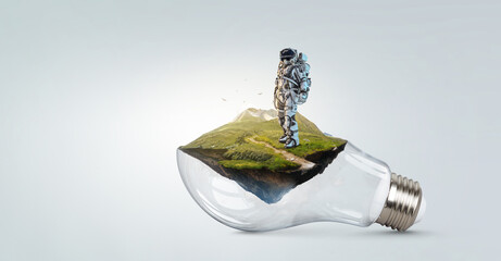 Wall Mural - spaceman on a light bulb
