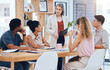 © Deen Jacobs/peopleimages.com - Ceo woman consulting young team, explain business strategy and professional working together. Group of employees listen to boss, corporate office manager planning meeting and solution focused staff