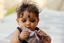 Playing With A Handkerchief A Small Hindu Indian Child With A Mascara In The Eyes