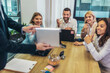 © Mediteraneo - Office colleagues  during meeting in conference room make video call.