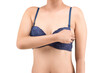© Leo Lintang - The woman in a blue bra holding her breast