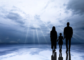 Wall Mural - Silhouettes of godparents with child and beautiful view of sky with grey clouds, space for text