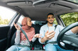 © Prostock-studio - Disappointed millennial muslim woman in hijab swears at her husband with smartphone while traveling together