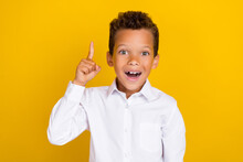 Photo Of Overjoyed Boy Wear Trendy Clothes Raise Arm Hand Evrika Brilliant Excellent Answer Solution Isolated On Yellow Color Background