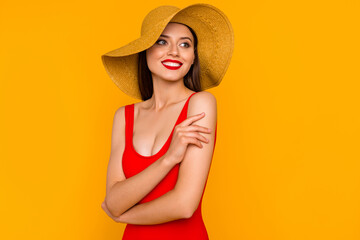 Wall Mural - Photo of charming cheerful lady hand touch shoulder look interested empty space isolated on yellow color background