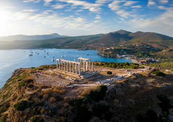 Wall Mural - aerial view of the beach and temple of poseidon at cape sounion at the edge of attica, greece, durin