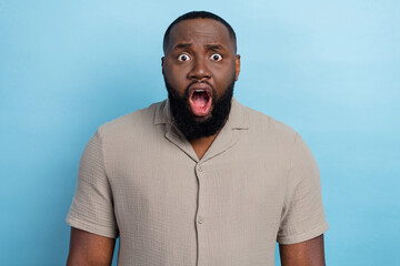 Wall Mural - Photo of shocked stunned person open mouth staring cant believe isolated on blue color background