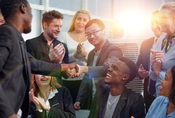 Wall Mural - Image employers in office shaking hands after successful negotia