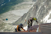 Workers At The Cableway Station. Aiguille Du Midi, Mont Blanc France