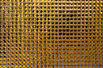 テクスチャ―　メタリックな金色のタイル　texture of golden sqare tiles