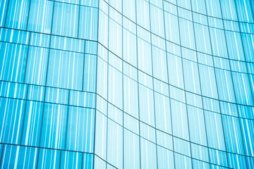 underside panoramic and perspective view to steel blue glass high rise building skyscrapers, business concept of successful industrial architecture