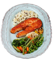 Wall Mural - Grilled salmon steak with brown rice and vegetables.