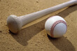 © SuperStock - Close-up of a baseball bat and a baseball
