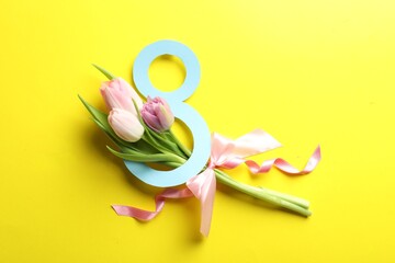 Sticker - 8 March card design with tulips on yellow background, flat lay. International Women's Day