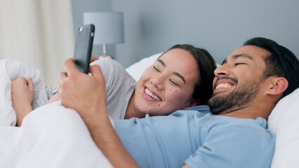 Poster - happy interracial couple, bed and phone scroll of a asian woman and arab man in a bedroom. in love p