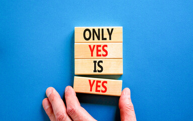 Wall Mural - Only yes is yes symbol. Concept words Only yes is yes on wooden blocks on a beautiful blue table blue background. Businessman hand. Business, psychological only yes is yes concept.