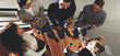 © New Africa - Group of coworkers talking during coffee break on stairs in office, top view. Banner design