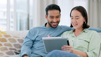 Wall Mural - Couple streaming funny meme video on tablet online, watching comedy movie on technology and relax with internet connection for social media. Comic, talking and Asian man and woman on web on the sofa