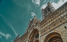 Lincoln Cathedral Landmark Photography From Below With Blue Clouds In The Sky