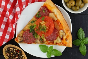 Sliced pizza on the table in the restaurant.