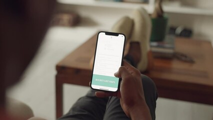 Poster - Phone, hands and internet with a man using mobile technology to search for a trip idea in his home. Bucket list, travel and wifi with a male looking online and reading a news article for ideas