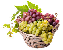 Bunches Of White And Pink Grapes In A Wicker Basket