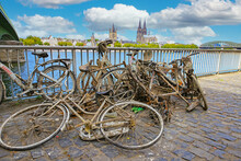Cologne, Germany - July 9. 2022: Pile Many Old Muddy Rusty Bicycles Thrown Tossed Into The Rhine River Water And Then Salvaged 