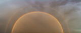 Fototapeta Perspektywa 3d - Rainbow against a dramatic thunderclouds
