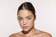 © master1305 - Closeup portrait of beautiful young girl with clean well-kept skin isolated over white background. Skin care. Facial treatment. Cosmetology, beauty and spa.