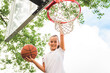 © Louis-Paul Photo - portrait of a kid girl playing with a basketball in park