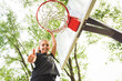 © Louis-Paul Photo - portrait of a kid girl playing with a basketball in park